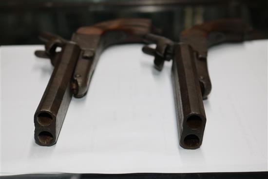 An Edwards flintlock pistol and two replicas